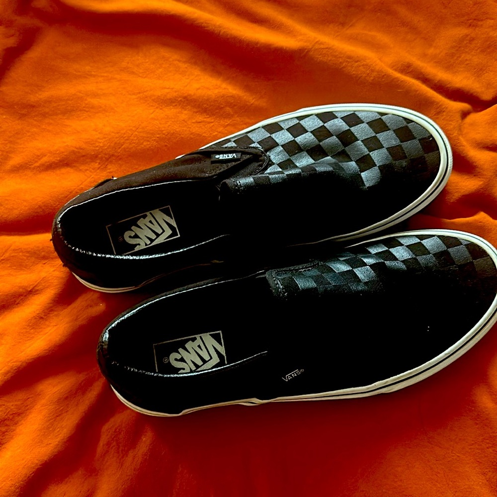 Vans slip ons, Sz 8.5 in men’s and 10 in women’s,